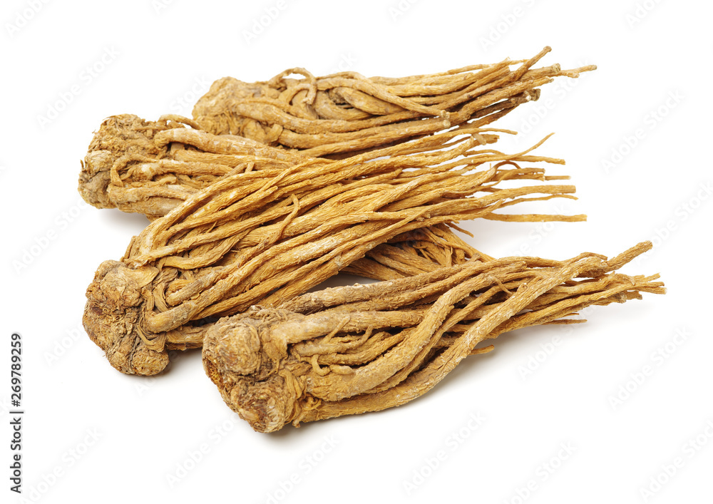 Angelica root used in chinese traditional herbal medicine, over white background. Radix angelicae sinensis, Angelica root used in chinese traditional herbal medicine, over white background. Radix angelicae sinensis,