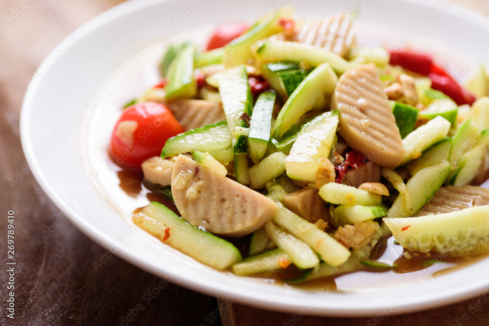 Spicy cucumber salad with steamed pork sausage, Thai food Spicy cucumber salad with steamed pork sausage, Thai food