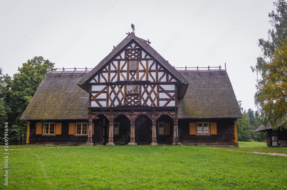 Example of early 20th century arcaded house in heritage park in Olsztynek town Example of early 20th century arcaded house in heritage park in Olsztynek town