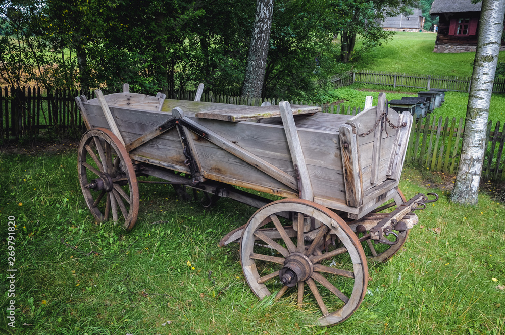 Old traditional wooden horse drawn carriage in Masuria region of Poland