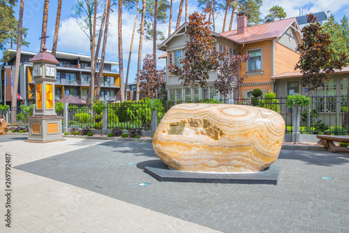 City Jurmala, Latvian Republic. Urban street view with tourists and big rock. Travel photo.2019. 25. May