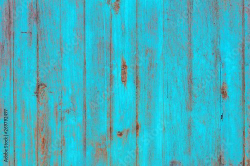 Vintage beach wood background - Old weathered wooden plank painted in turquoise blue pastel color.