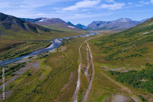 Valley of the Bolshaya Khadata River on a sunny August afternoon (aerial photography). Polar Ural, Russia photo