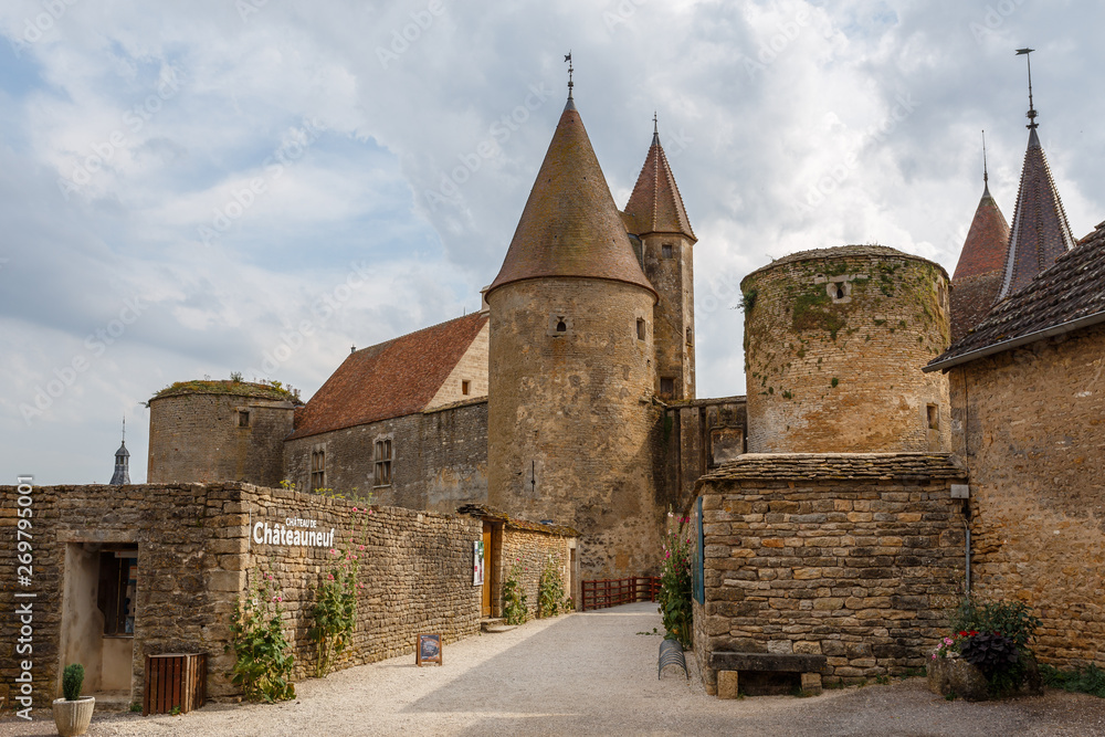 CHATEAUNEUF / FRANCE - JULY 2015: View to the medieval castle of Chateauneuf-en-Auxois town, France