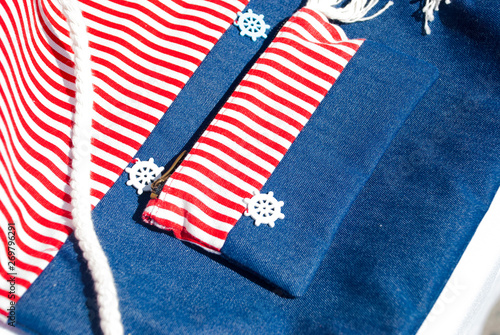 Denim striped fabric with small bag sea theme.
