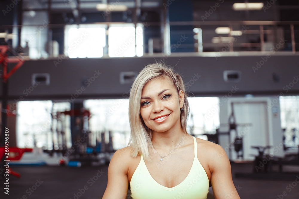 sporty girl close-up in the gym sporty girl close-up in the gym