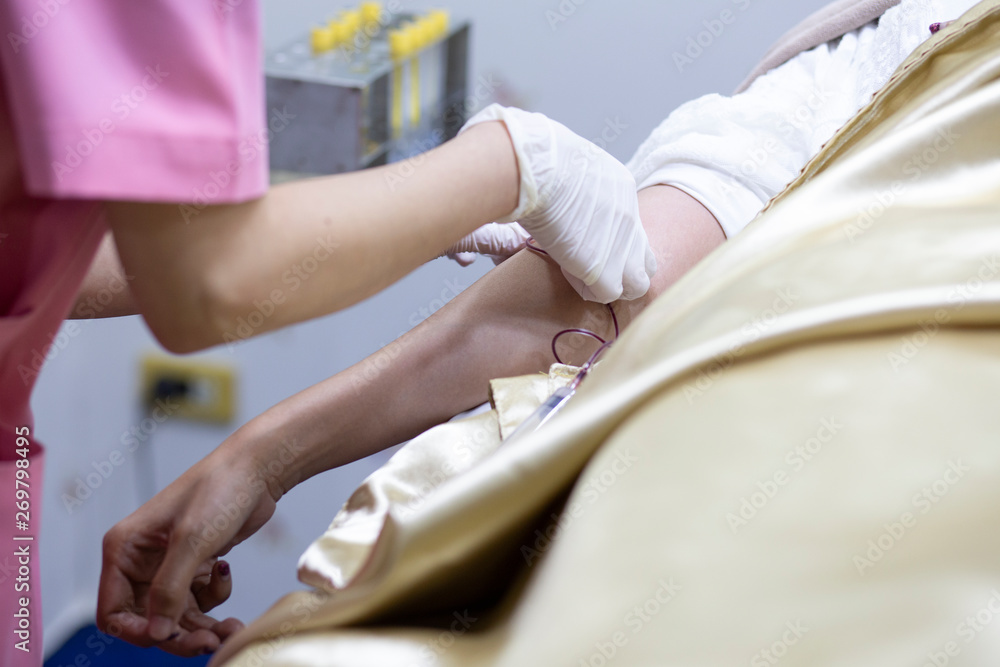 The nurse is holding hands hold the patient's blood,Blood Collection Science Sample Examination for Health Care