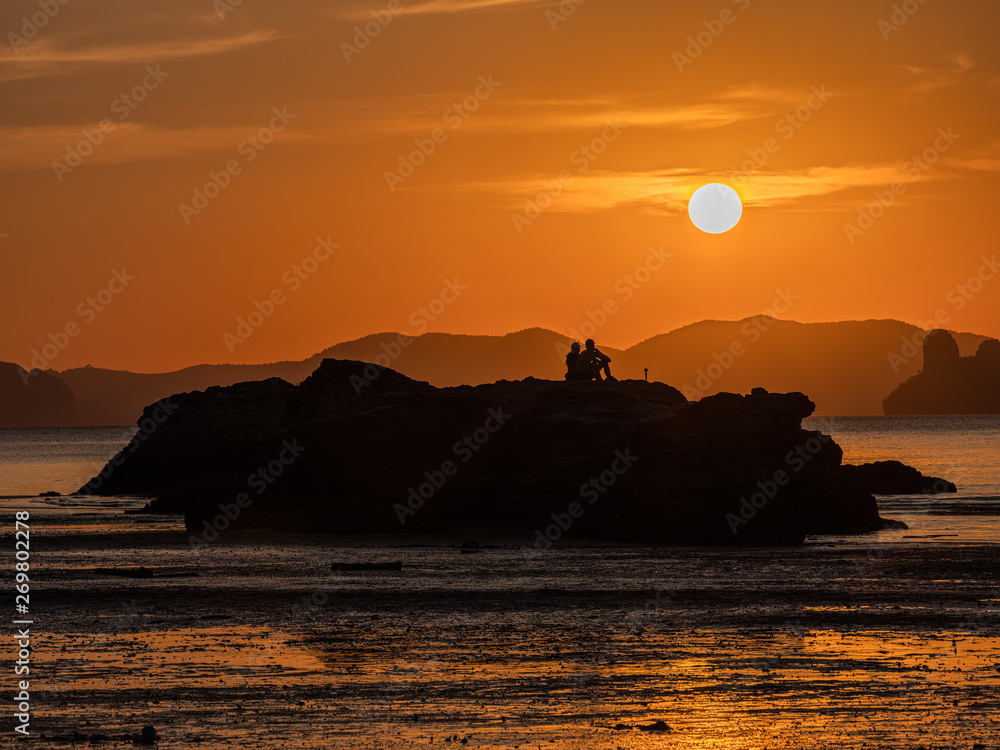 Silhuate couple with romantic sunset time