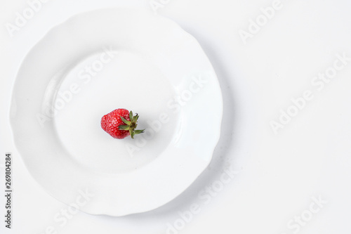 strawberries on a white plate
