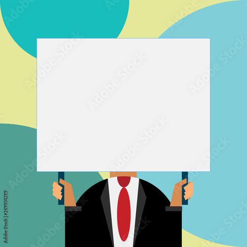 Just man chest dressed dark suit tie no face holding blank big rectangle