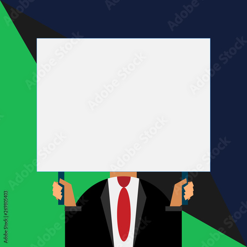 Just man chest dressed dark suit tie no face holding blank big rectangle