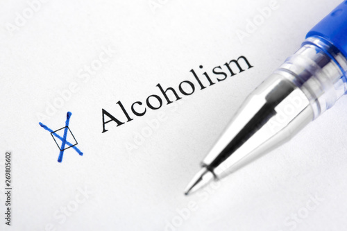 Alcoholism. Filling in the questionnaire, documents. The checkboxes are filled with a black pen on a white background. Questionnaire, survey.
