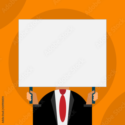 Just man chest dressed dark suit tie no face holding blank big rectangle