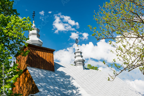 Orthodox wooden church in Lopienka village in Bieszczady mountains,Poland photo