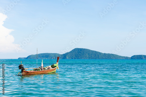 Traditional thai longtail boat at famous sunny Long Beach, Thailand, Koh Phi Phi Don, Krabi province, Phuket Andaman sea.