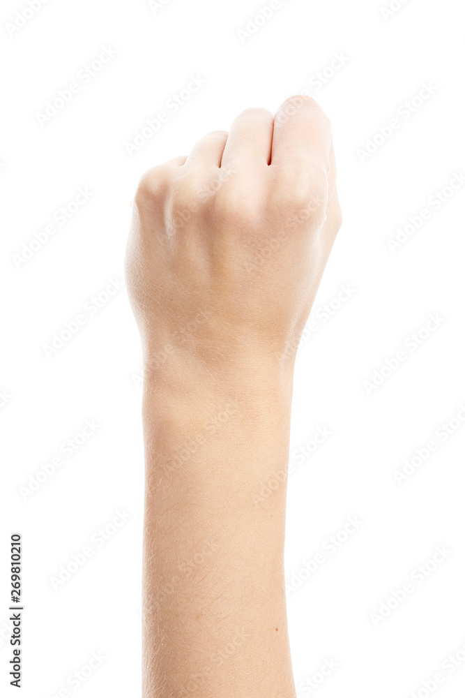 Female hand isolated on white background. White woman's hand showing symbols and gestures. Fist Female hand isolated on white background. White woman's hand showing symbols and gestures. Fist