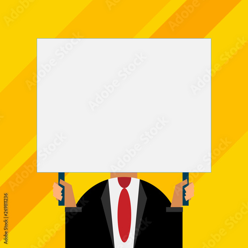Just man chest dressed dark suit tie no face holding blank big rectangle