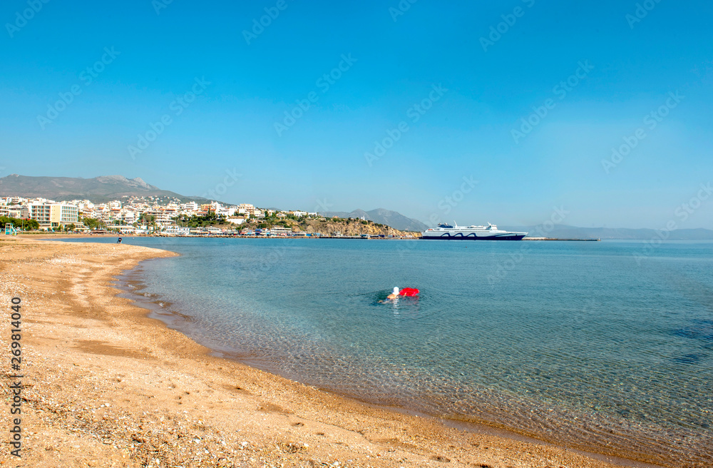 Obraz premium view to the beach and Rafina's port. Greece.