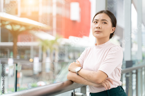 Free Download Sad woman standing in the city - GFXLoad