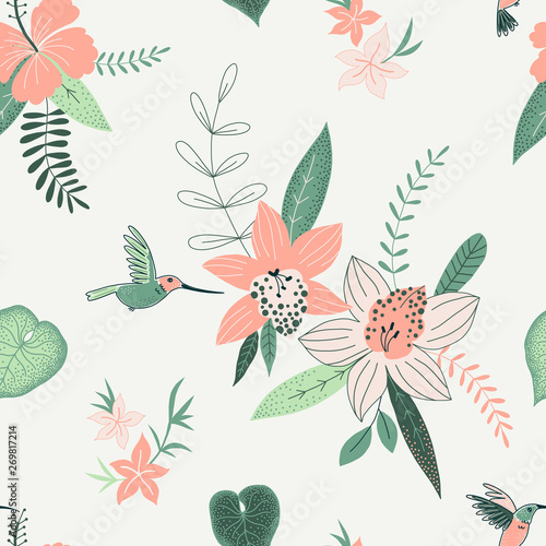 Tropical flowers color vector seamless pattern. Jungle plants background. Flying hummingbird. Exotic plants orchids and hibiscus. Decorative botanical textile, wallpaper, wrapping paper design