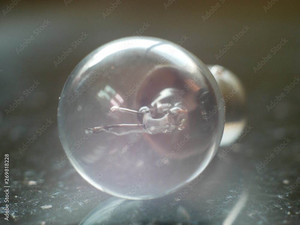 Light bulb on black background Light bulb on black background