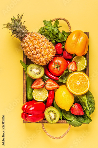 Fruits and vegetables rich in vitamin C in box.
