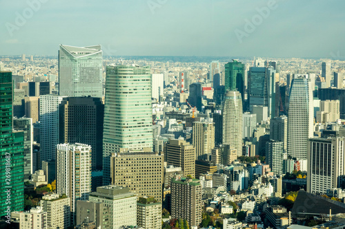 Aerial View Of Tokyo City Buildings Against Cloudy Sky