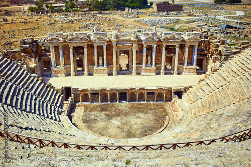 Ruins of old amphitheater, Hierapolis in Pamukkale. Is popular tourist destination in Turkey. Panorama ancient Greco Roman city