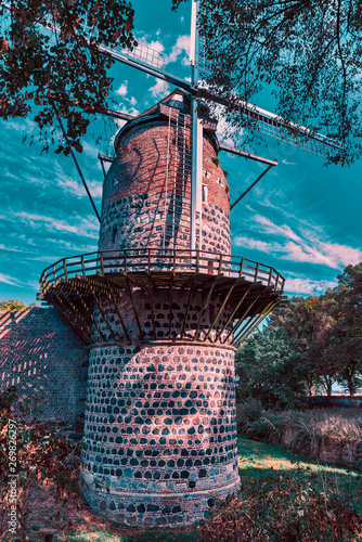 Medieval wind mill and old town wall of Zons photo