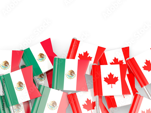 Pins with flags of Mexico and canada isolated on white.