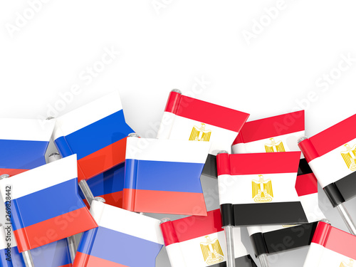 Pins with flags of Russia and egypt isolated on white.
