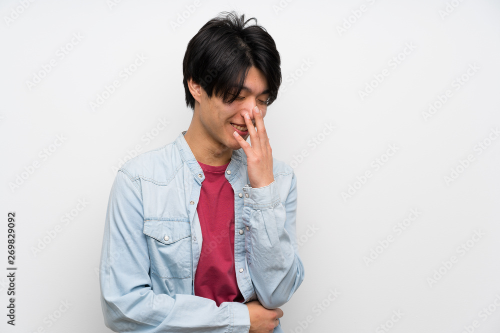 Asian man on isolated white background smiling a lot Asian man on isolated white background smiling a lot