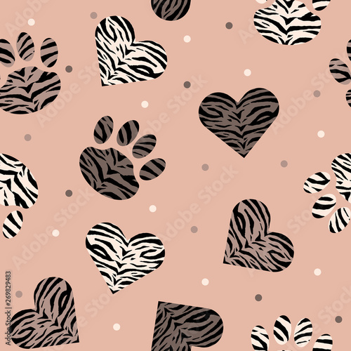 Seamless pattern of animal skin in shape of heart and paw: leopard, tiger and zebra. Trendy animal print. Fashion vector illustration.
