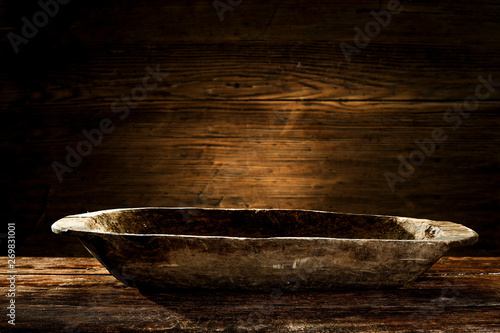Wooden old plate of free space for your decoration and dark mood background of free space for your decoration. 
