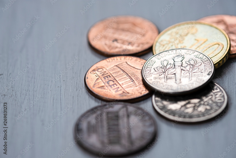 Closeup USA coins on wooden table. Saving and investment concept. Closeup USA coins on wooden table. Saving and investment concept.