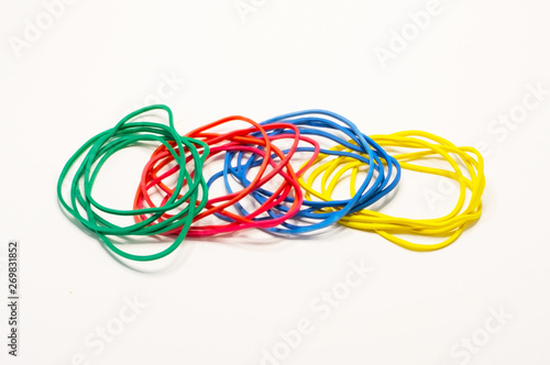 Multicolored stationery gum on a white background