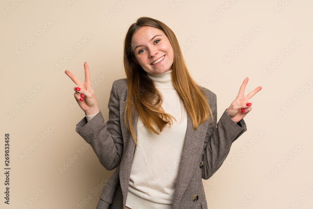 Young business woman showing victory sign with both hands Young business woman showing victory sign with both hands