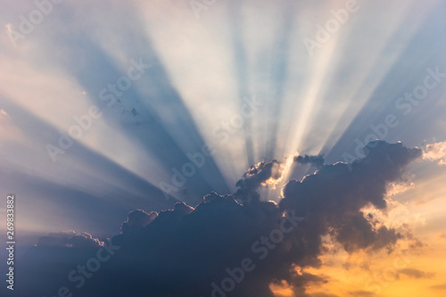 Sunshine in clouds on blusky photo