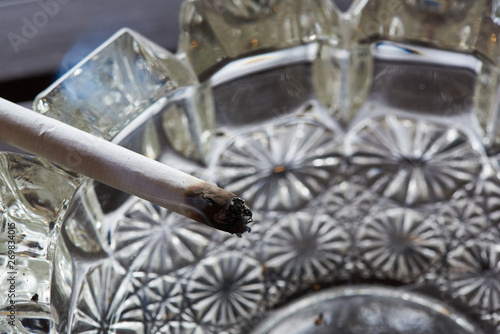 Wallpaper Mural A cigarette and smoke on the glass ashtray Torontodigital.ca