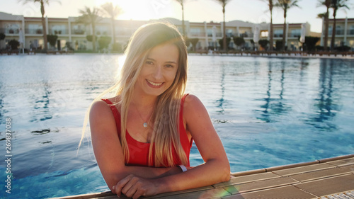 Beautiful girl in the swimming pool.