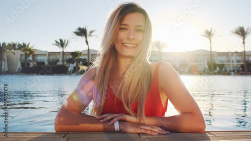 Beautiful girl in the swimming pool.