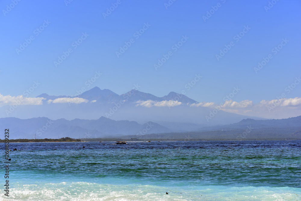 View to Lombok across the sea from Gili Trawangan Island, Indonesia