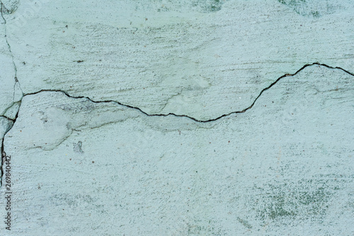 Texture, wall, concrete, it can be used as a background. Wall fragment with scratches and cracks