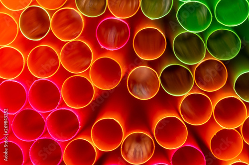 A close up shot of colored straws. The straws are used to drink drinks without putting your mouth to the glass