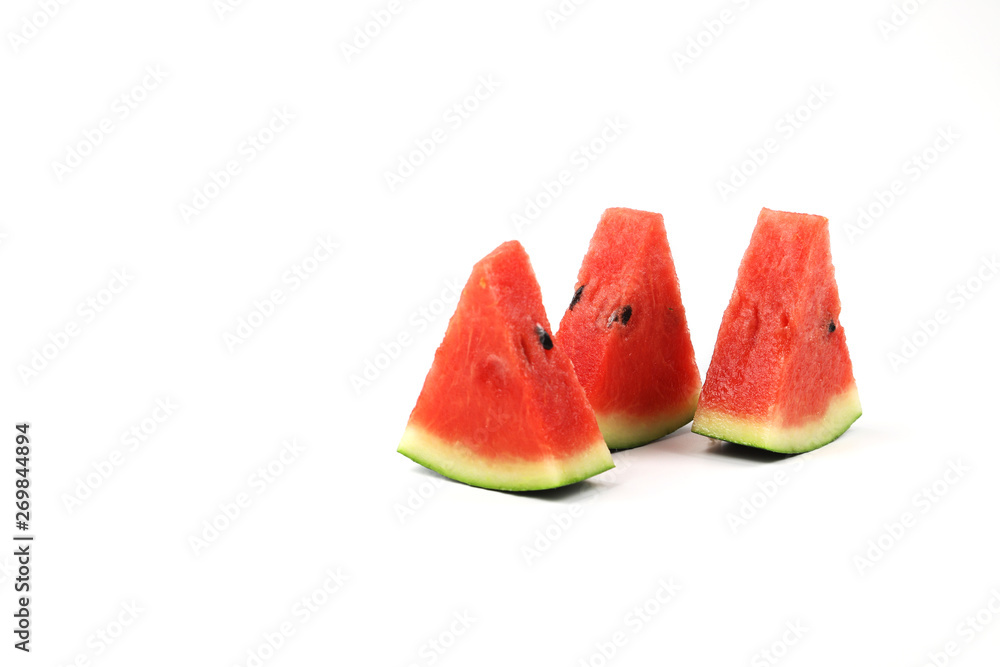 Watermelon slices on white background with selective focus