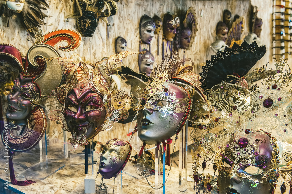 Venetian carnival mask. Street shopping. Famous souvenir. Italian market. Italy Venice,