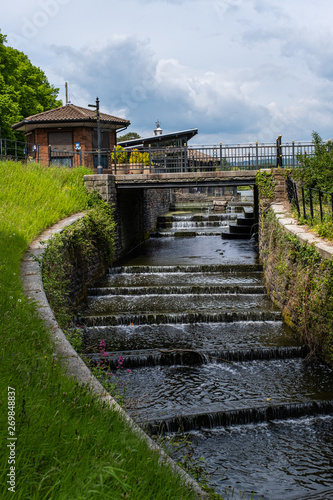 Roath Park Waterfall Cardiff on a Summer Sunny Cloudy Day