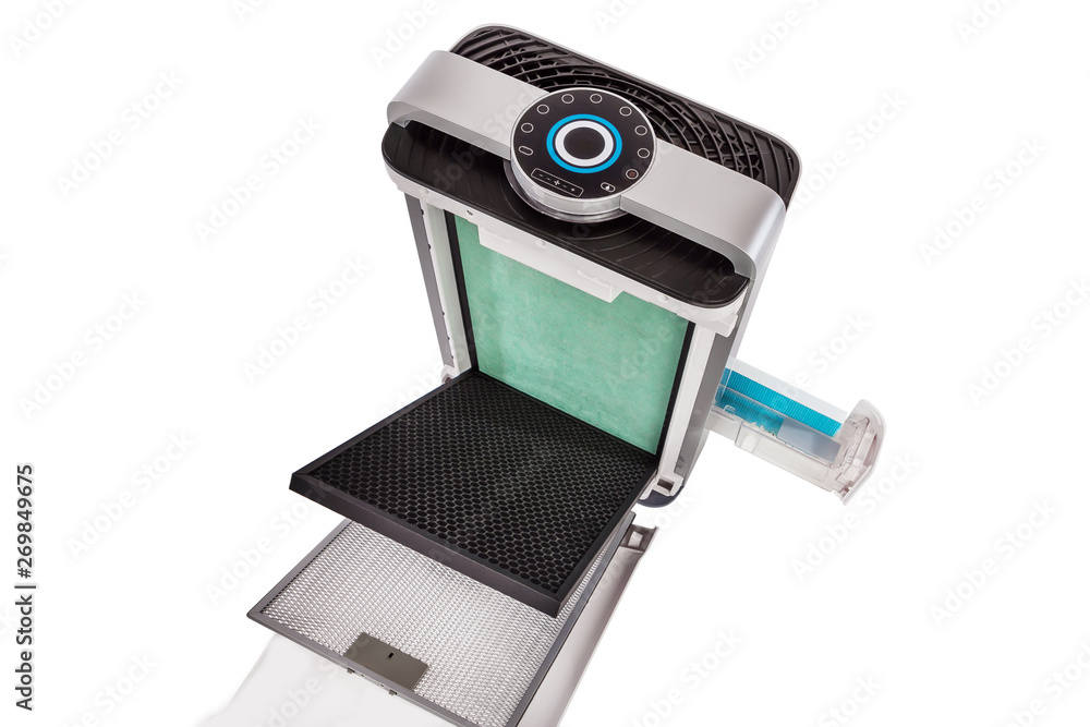 Air purification. Disassembled air cleaner with replaceable cartridges. Air hygiene support system. Replacing the air filter. Clean air at home. Ecology at home. Air purification. Disassembled air cleaner with replaceable cartridges. Air hygiene support system. Replacing the air filter. Clean air at home. Ecology at home.