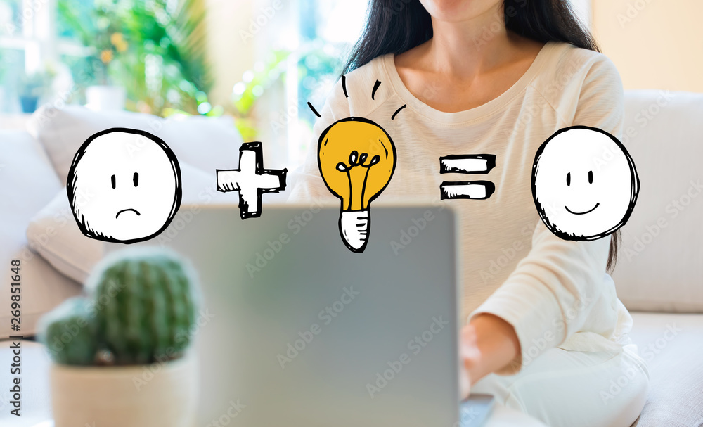 Good idea equals happy with woman using her laptop in her home office Good idea equals happy with woman using her laptop in her home office