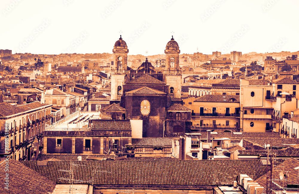 Sunset in Catania, aerial cityscape, traditional architecture of Sicily,  Southern Italy.